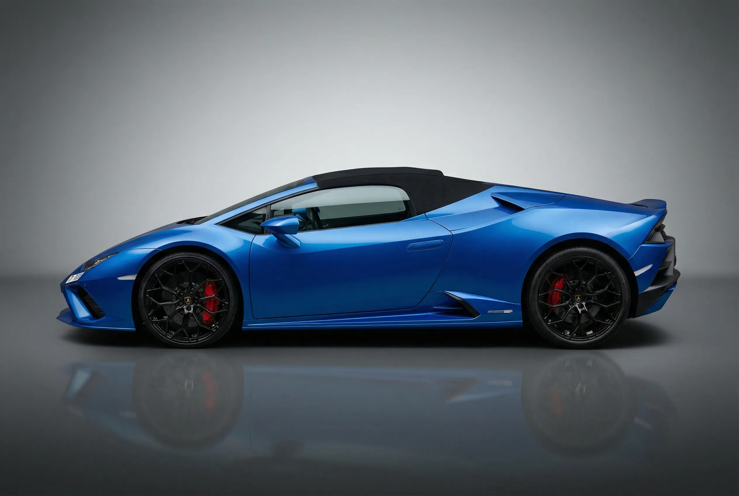 Lamborghini Huracan Evo Spyder 2022 Blue rental in Dubai thumbnail 2