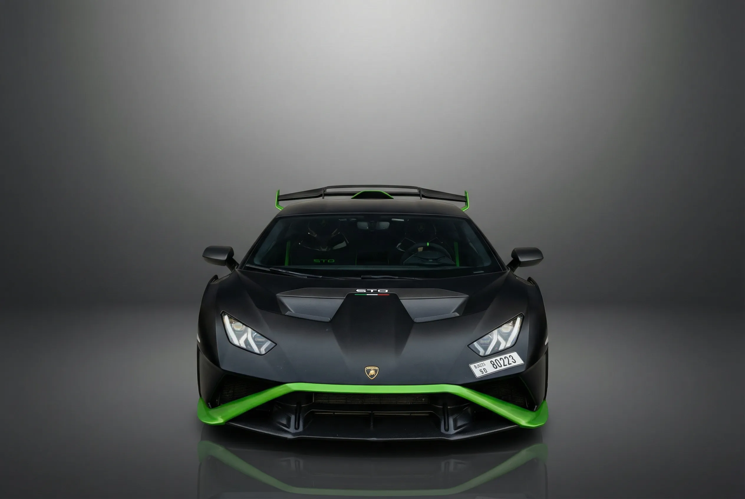 Lamborghini Huracan Sto 2022 Green rental in Dubai thumbnail 2